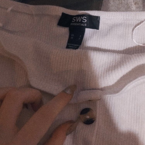 A white tube top with with brown a tan buttons - Picture 2 of 3